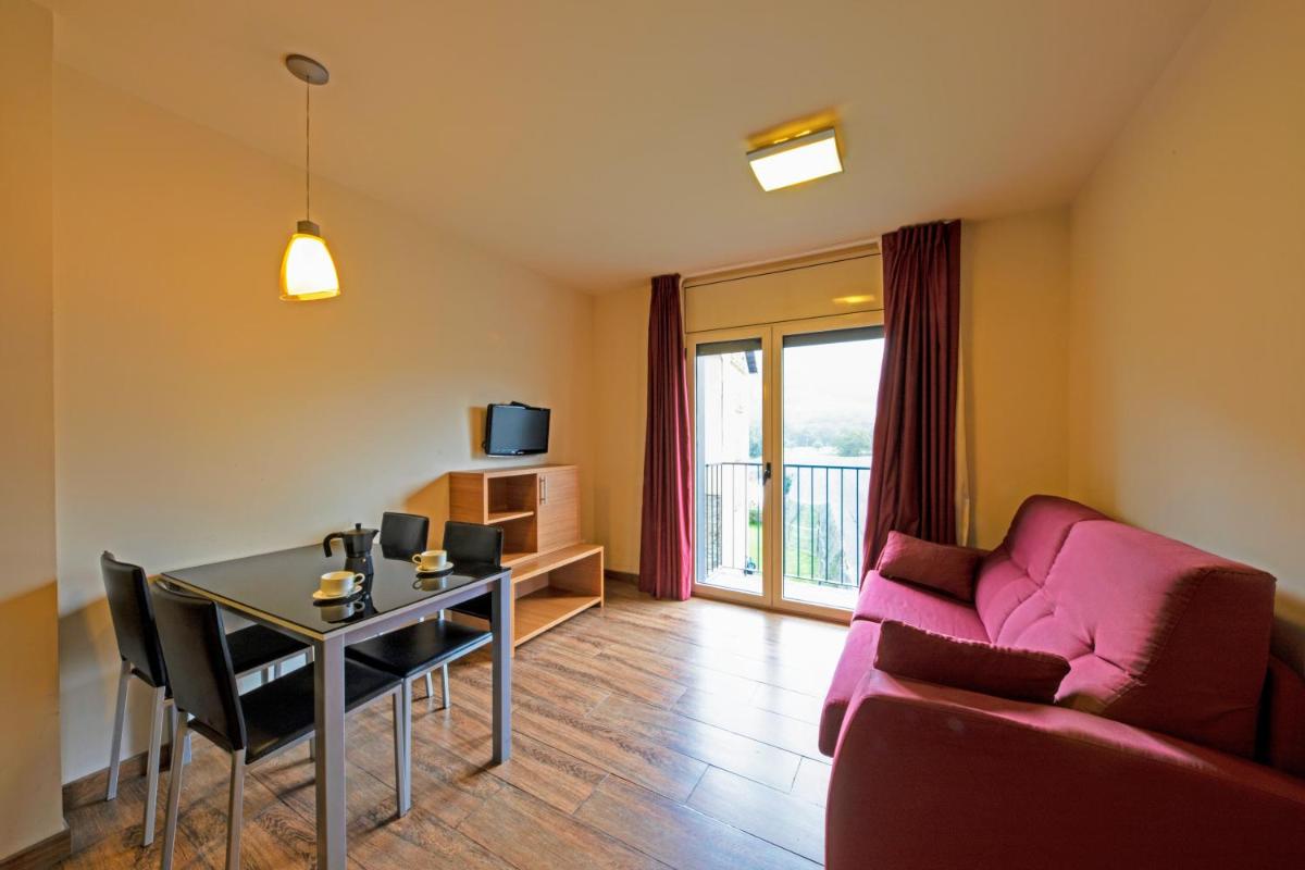 Zona de estar de Aparthotel Trainera