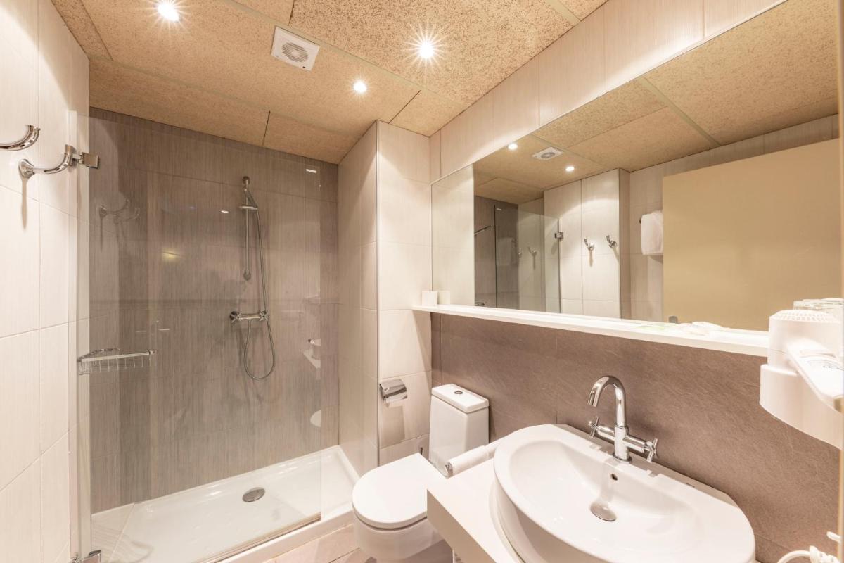 Un baño de Aparthotel Trainera