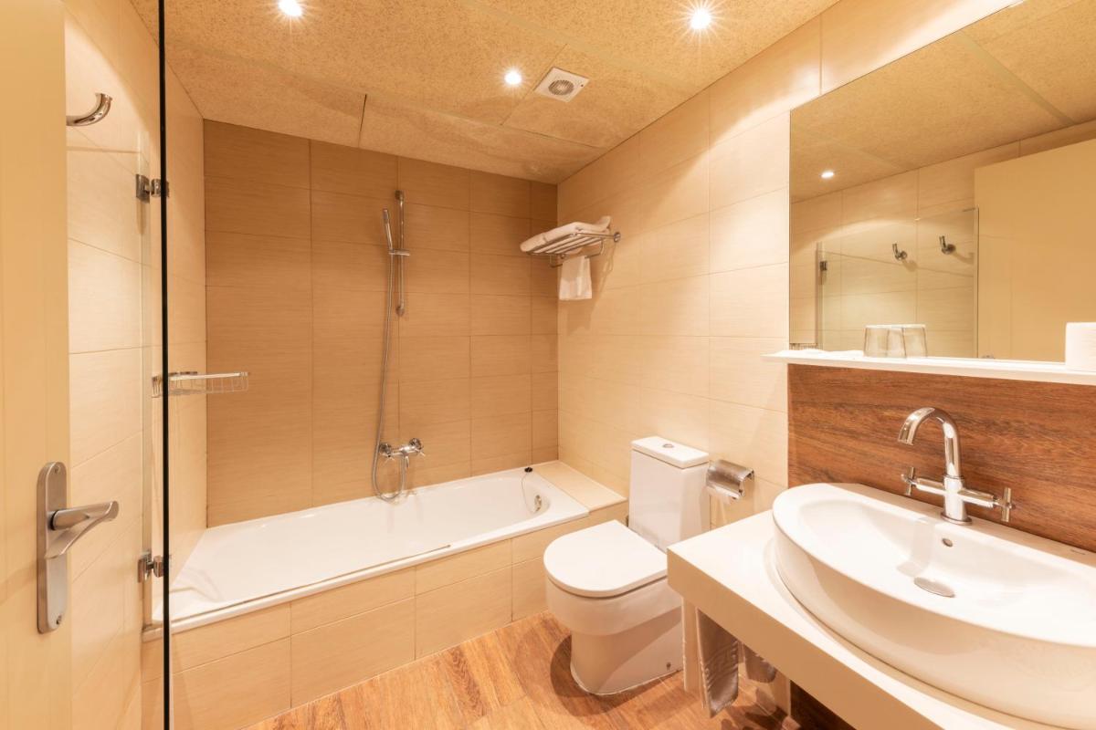Un baño de Aparthotel Trainera