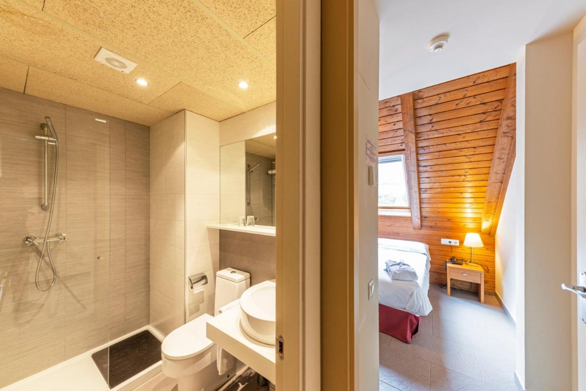 Un baño de Aparthotel Trainera