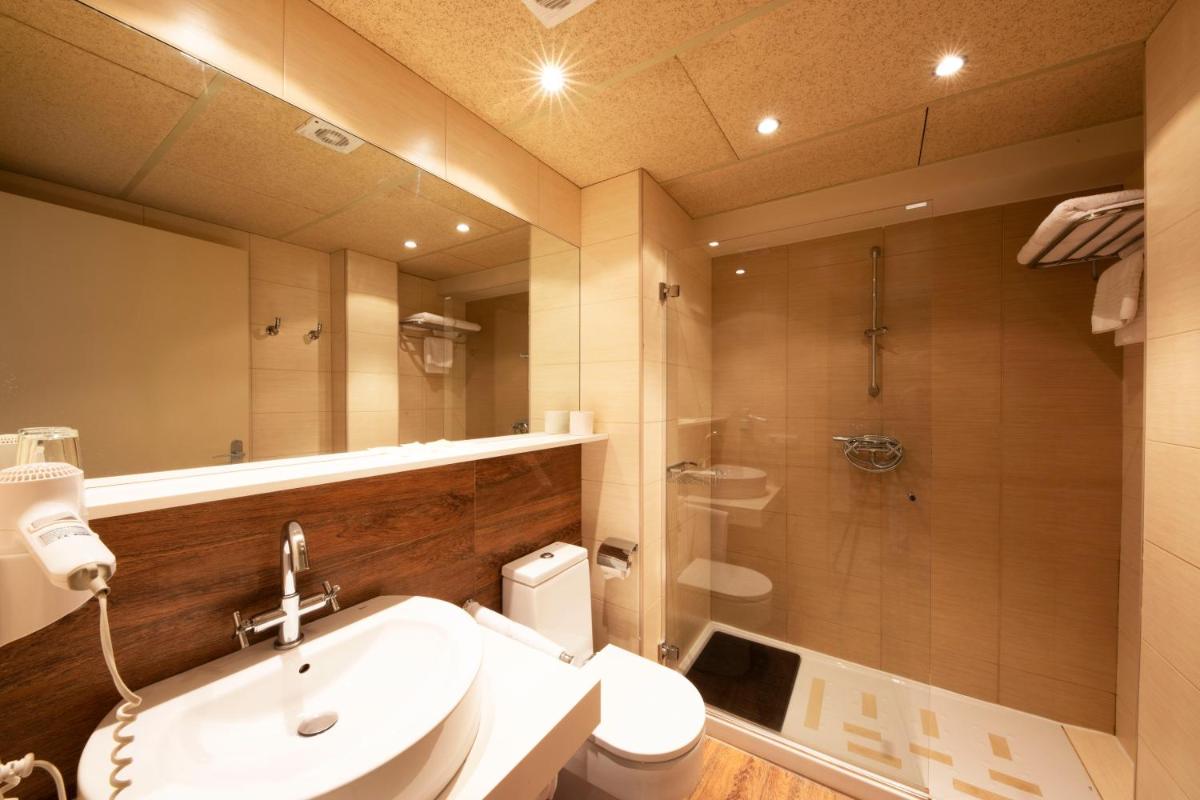 Un baño de Aparthotel Trainera
