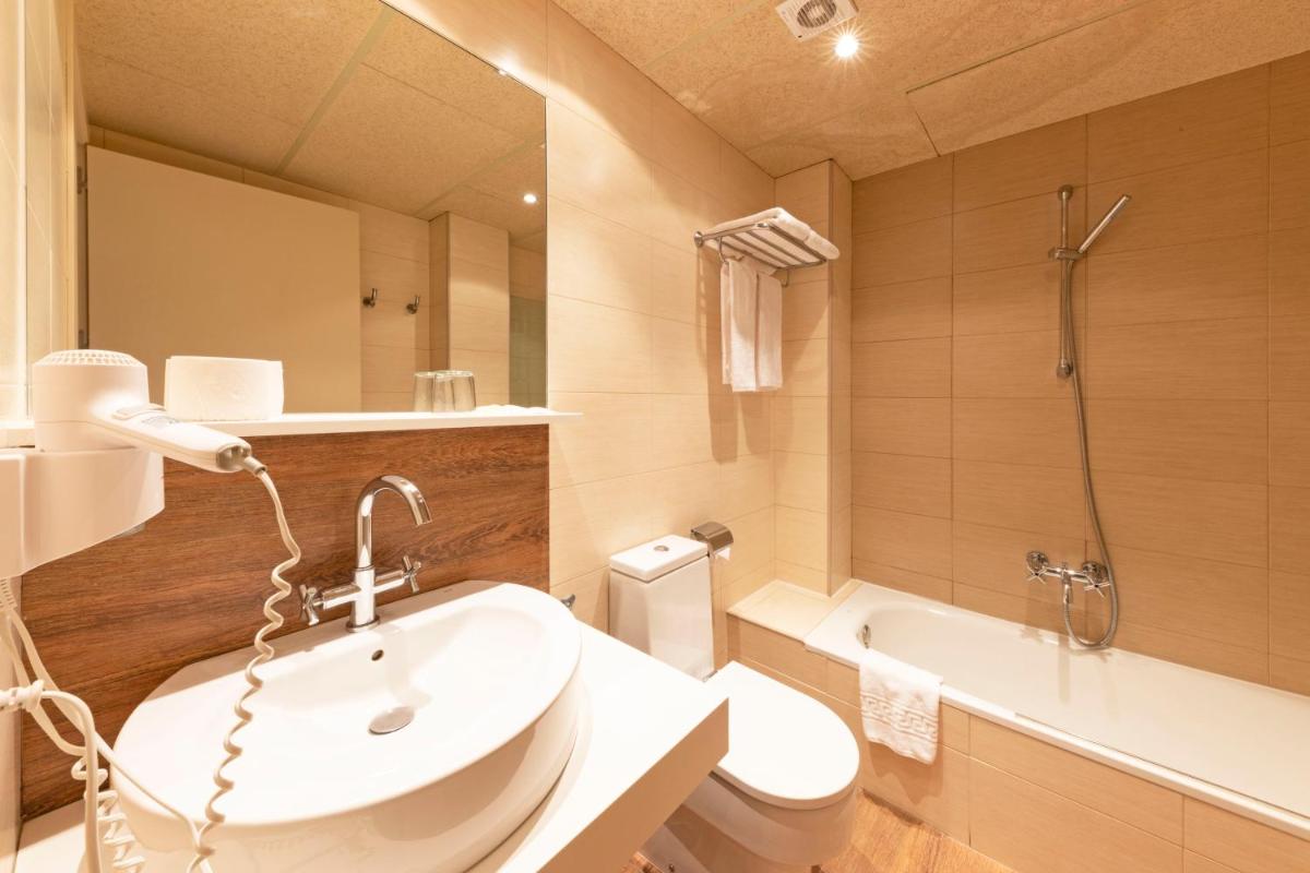 Un baño de Aparthotel Trainera