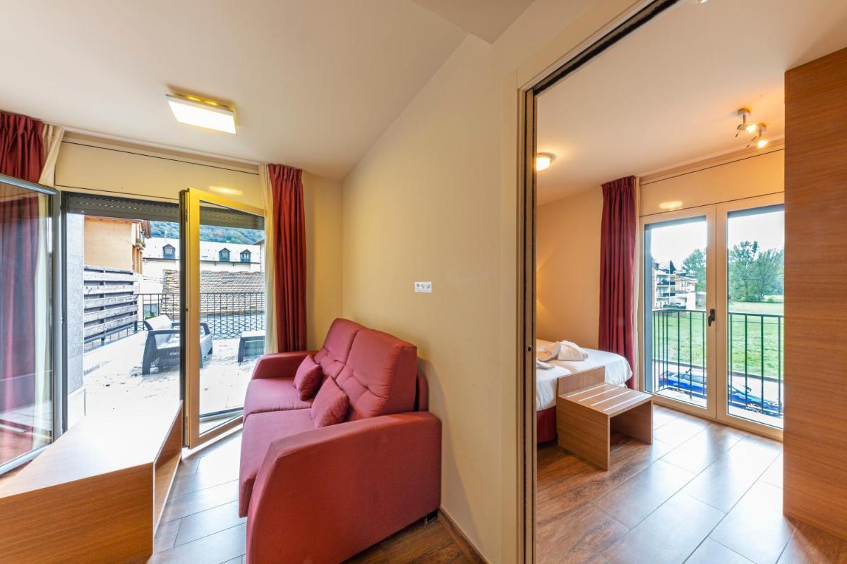 Zona de estar de Aparthotel Trainera