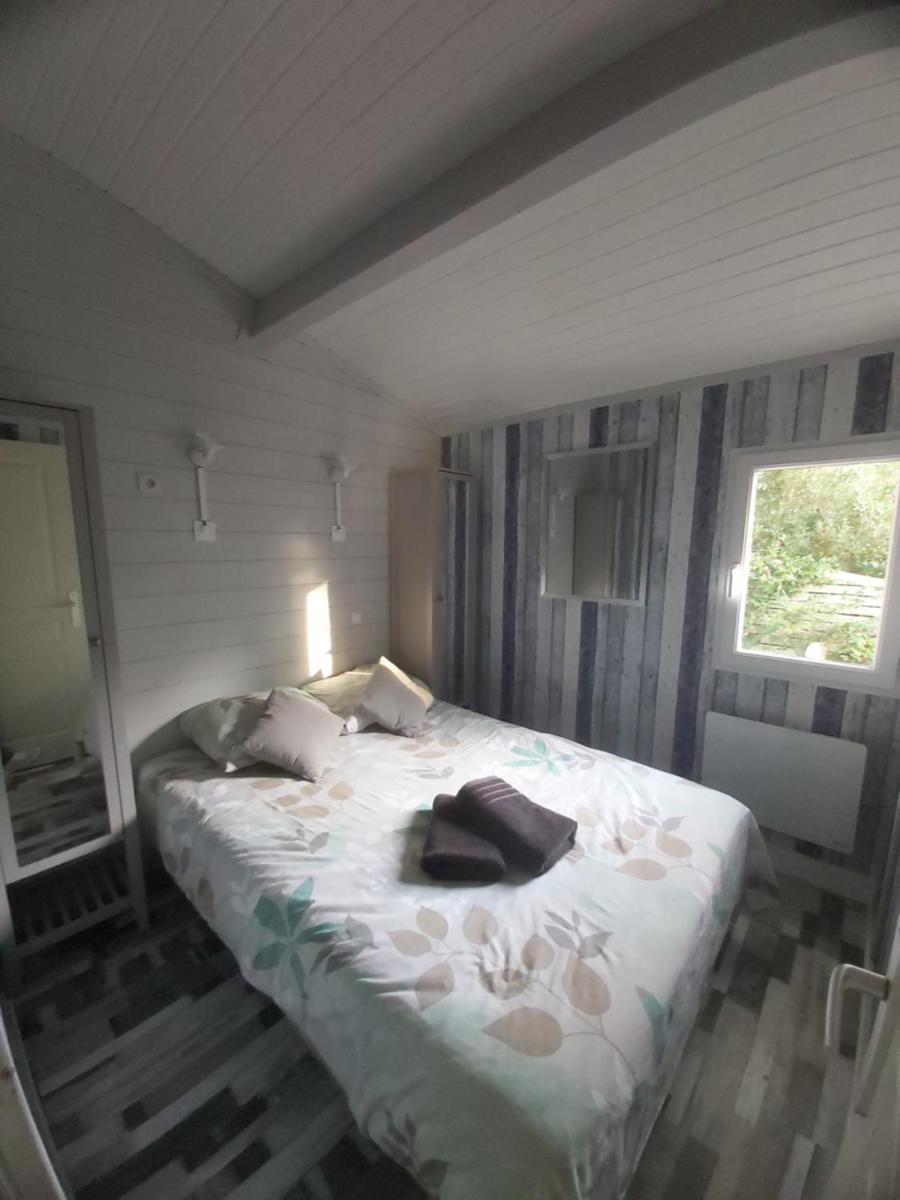Chalet T3/clim/wifi/pkg/terrasse/15 min plages - Housity