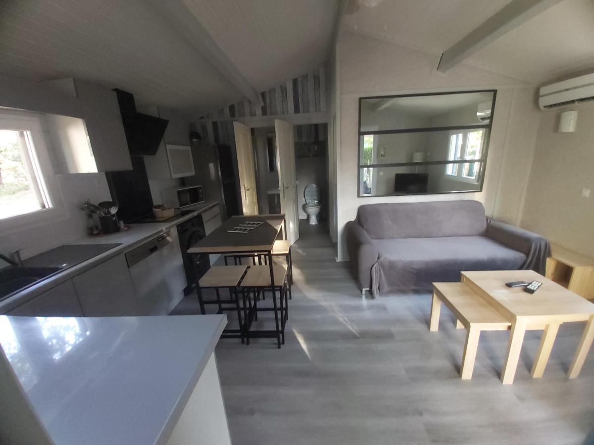 Chalet T3/clim/wifi/pkg/terrasse/15 min plages - Housity