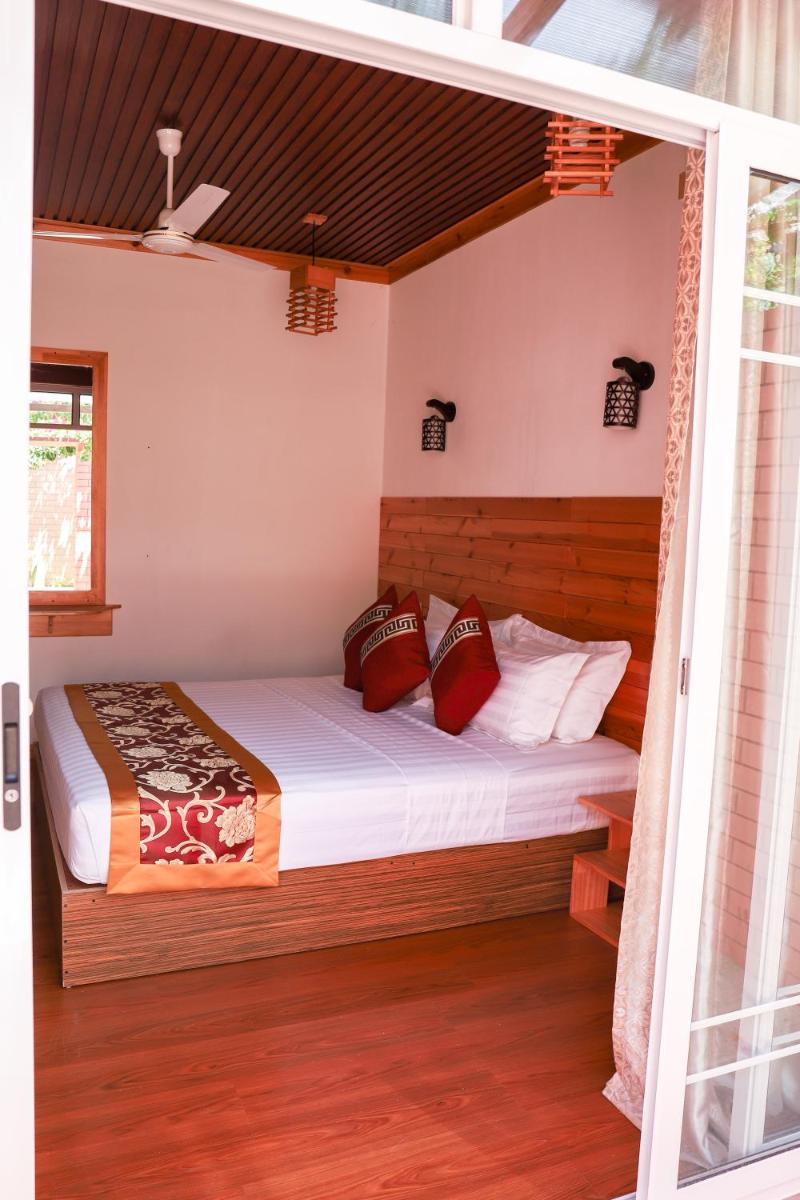 New Breeze Thoddoo Inn - Housity