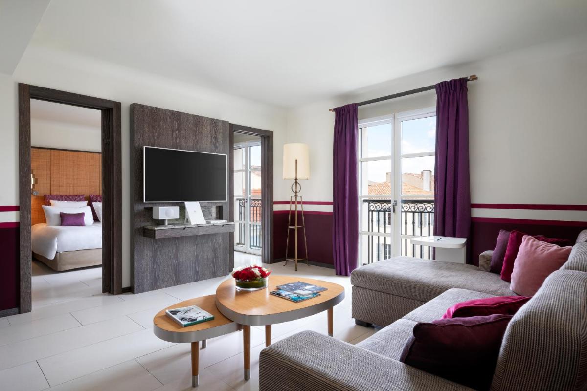 Un ou plusieurs lits dans un hébergement de l'établissement Hôtel de Paris Saint-Tropez