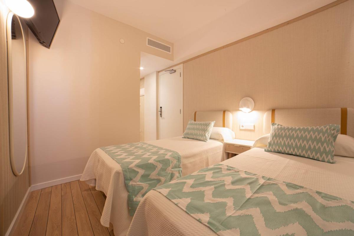 Cama o camas de una habitación en Ambassador Playa II