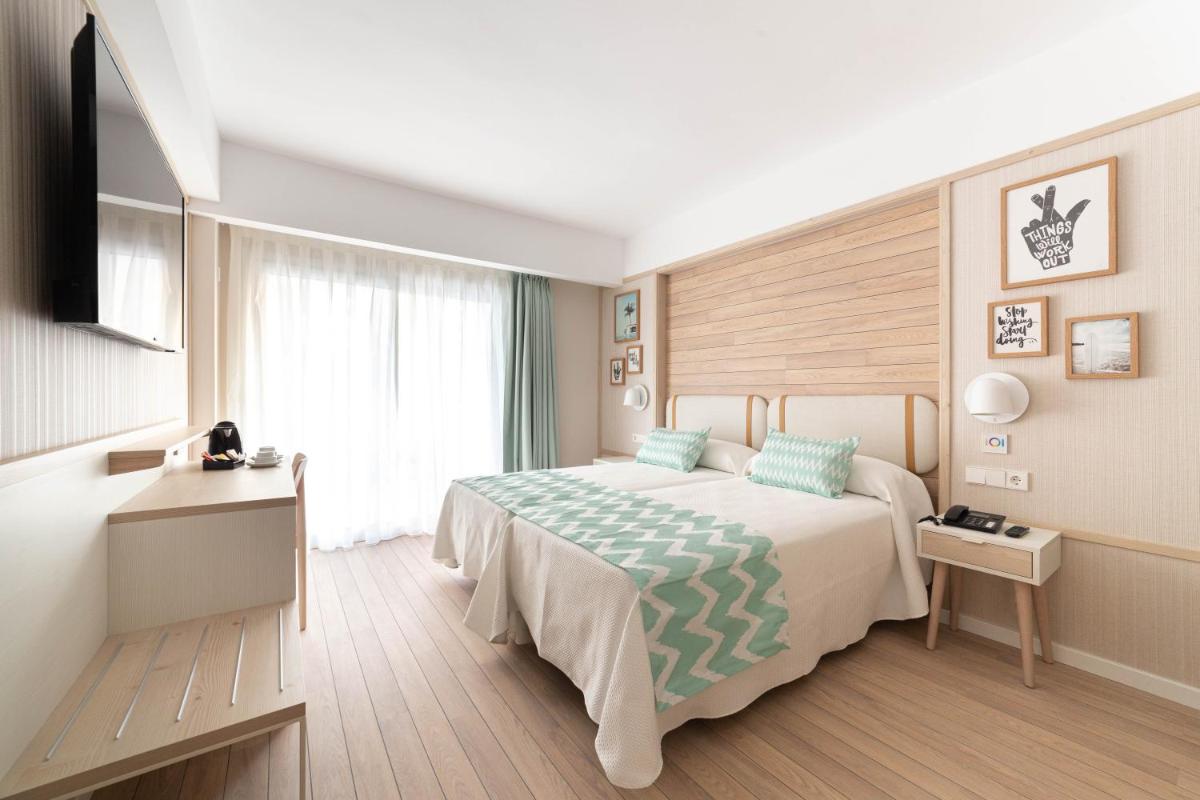 Cama o camas de una habitación en Ambassador Playa II