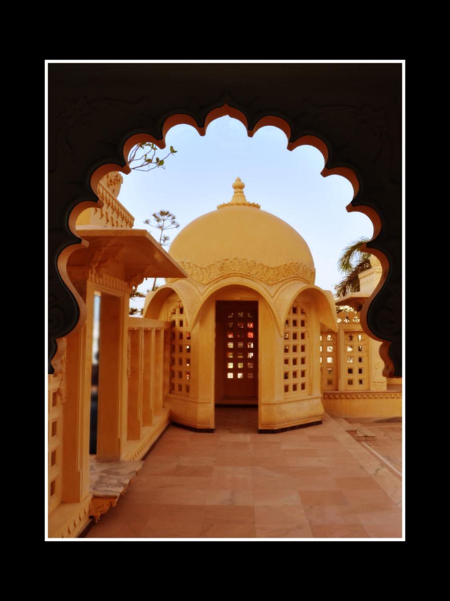an entrance to a building with an archway at Chunda Palace in Udaipur