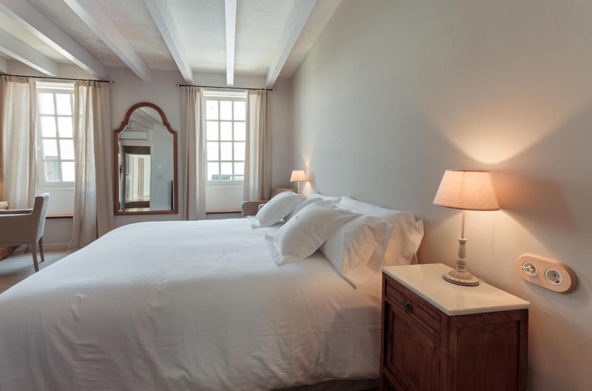 Cama o camas de una habitación en Jardí de Ses Bruixes Boutique Hotel