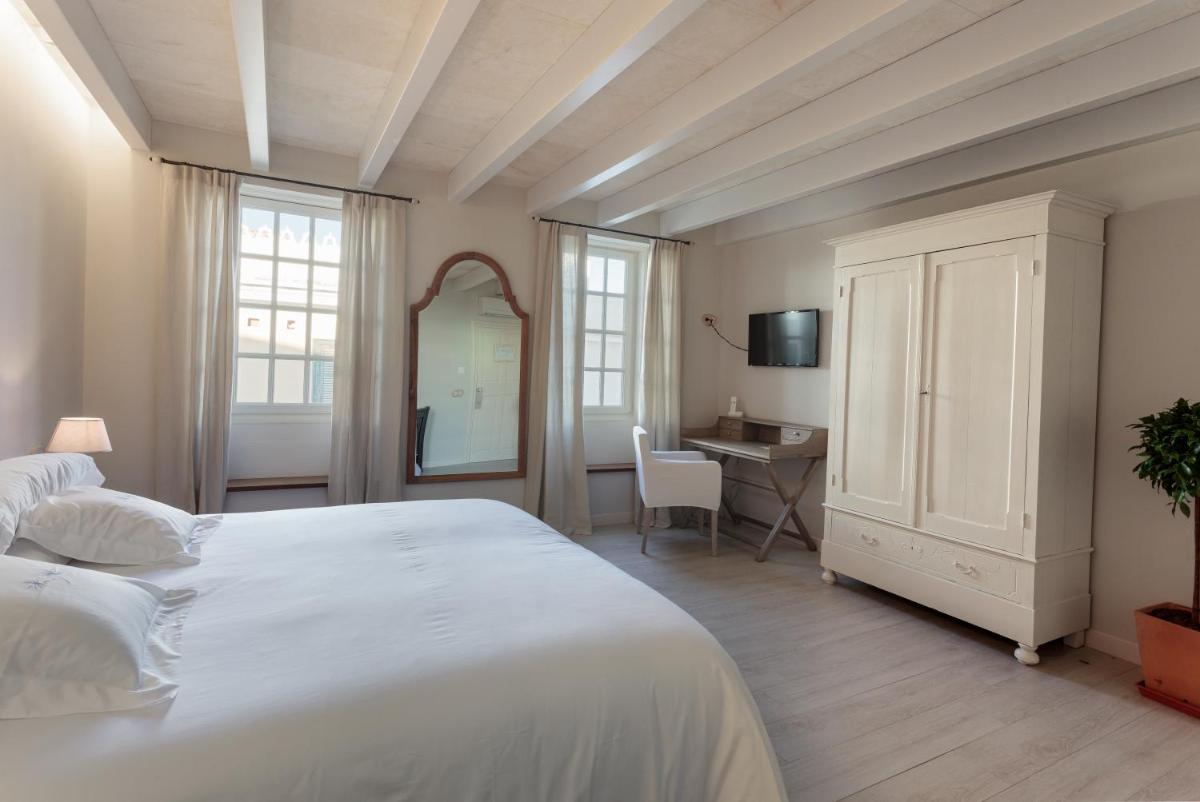 Cama o camas de una habitación en Jardí de Ses Bruixes Boutique Hotel