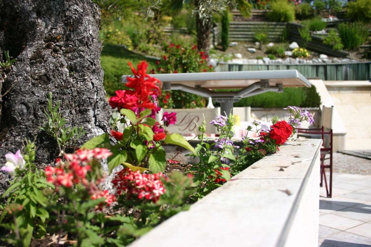 Jardin de l'établissement Hotel Blanc