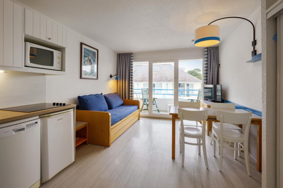Cuisine ou kitchenette dans l'établissement Résidence Pierre & Vacances la Corniche de la Plage