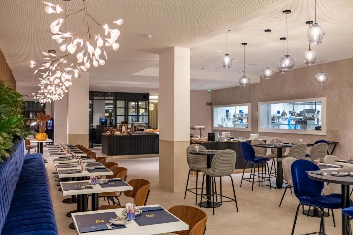 Restaurant ou autre lieu de restauration dans l'établissement GOLDEN TULIP LYON OUEST TECHLID Hotel & Spa