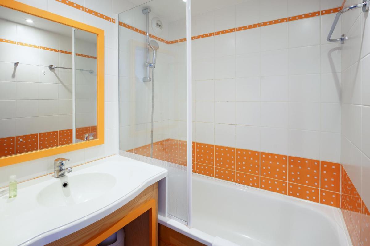 Salle de bains dans l'établissement Résidence Pierre & Vacances la Corniche de la Plage