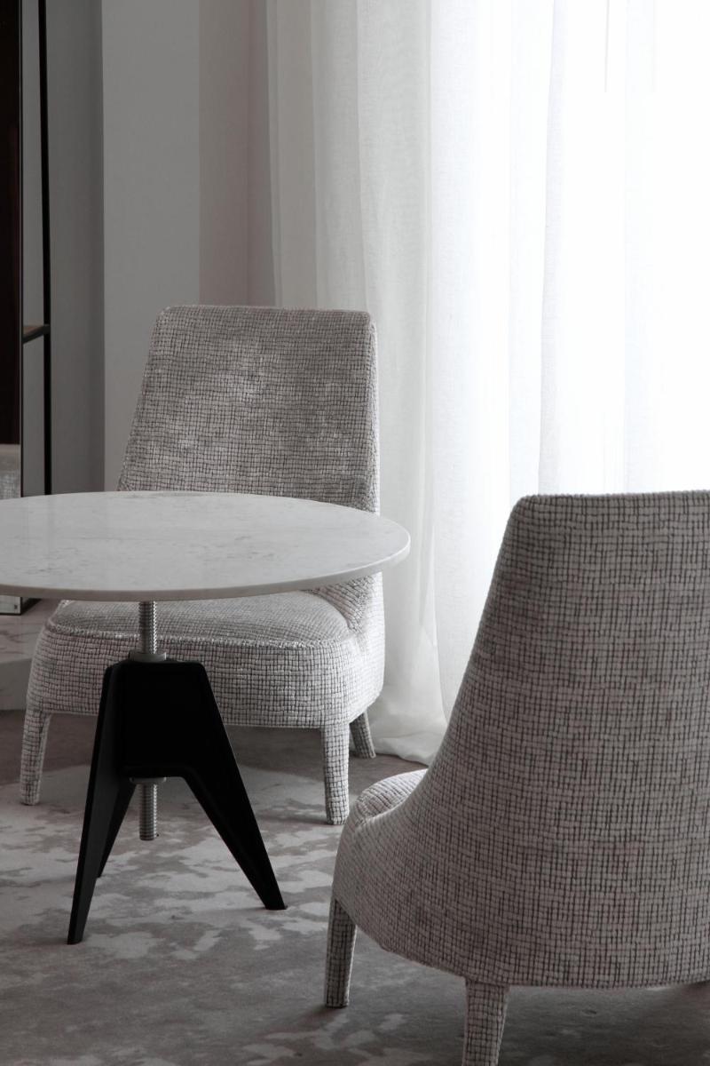 Coin salon dans l'établissement Yndo Hôtel