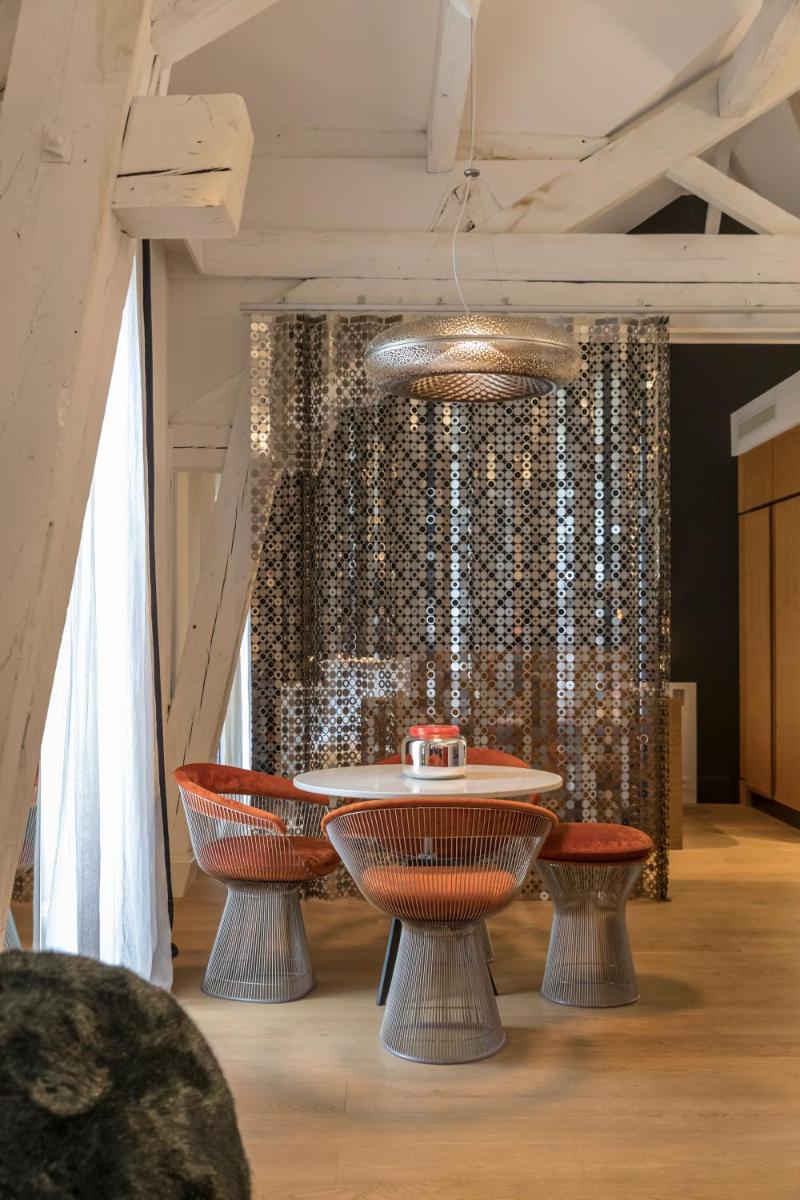 Coin salon dans l'établissement Yndo Hôtel