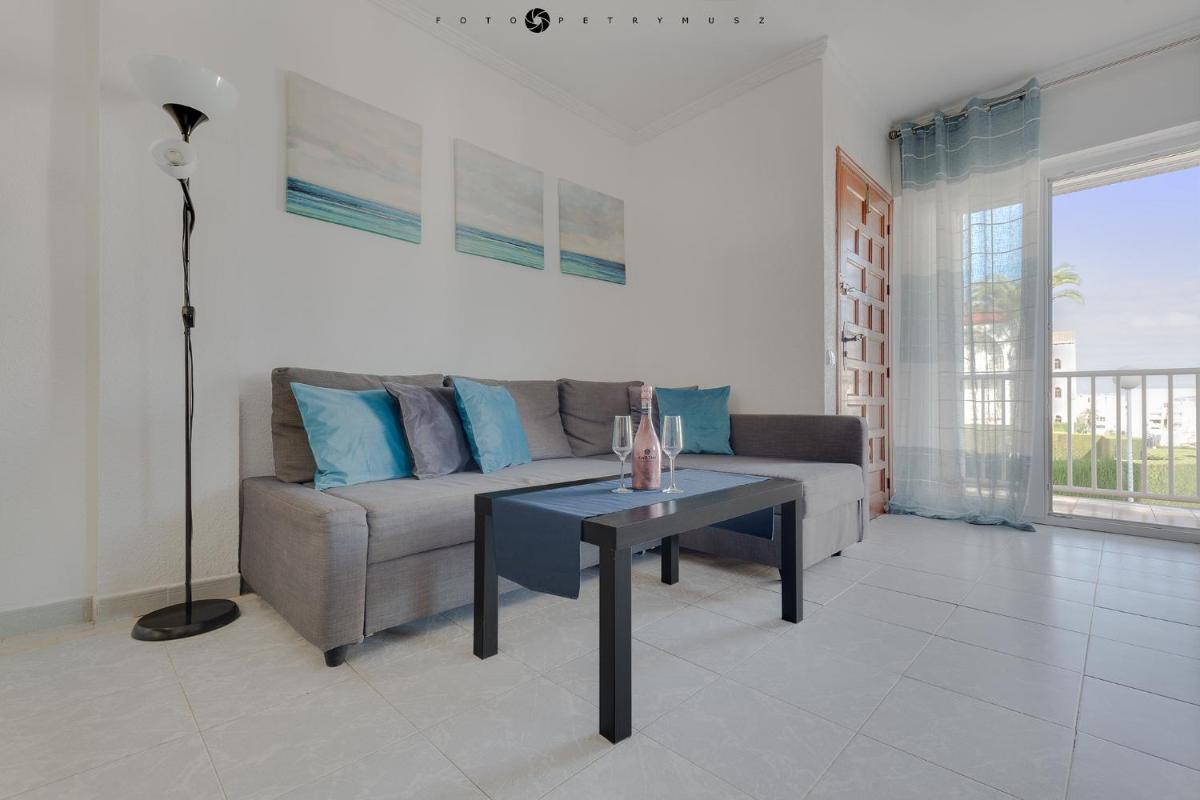 Apartment with pool, sea views & balcony less than 10min walk to La Mata Beach! - Housity