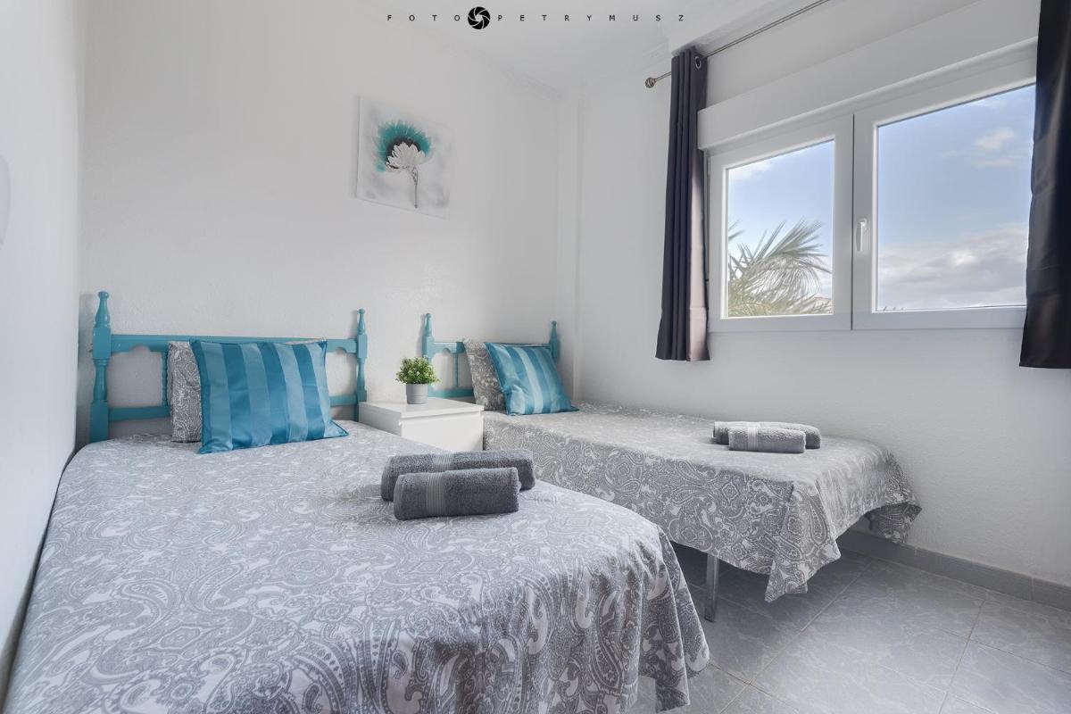 Apartment with pool, sea views & balcony less than 10min walk to La Mata Beach! - Housity