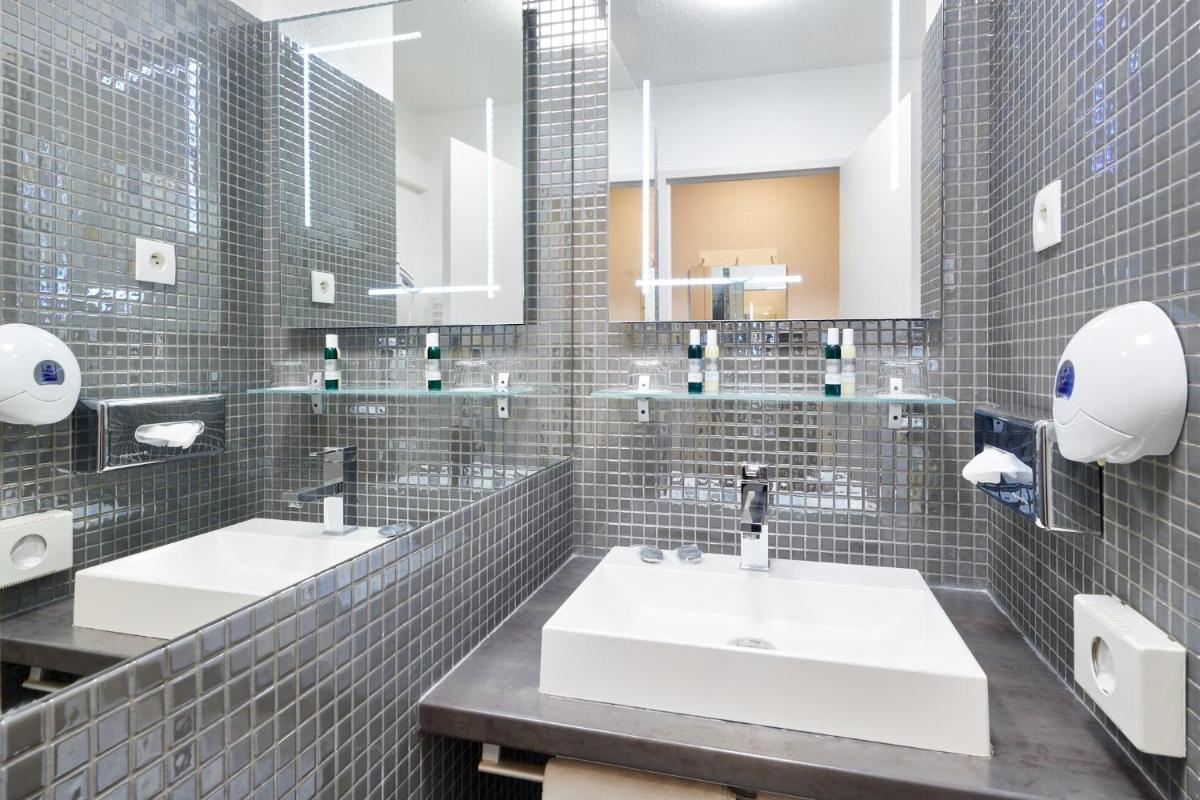Salle de bains dans l'établissement Les Terrasses d'Atlanthal
