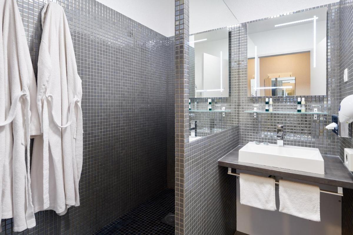 Salle de bains dans l'établissement Les Terrasses d'Atlanthal