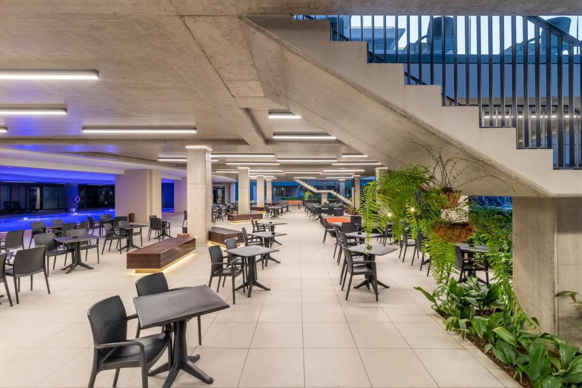 Um restaurante ou outro lugar para comer em Enotel Lido - All Inclusive