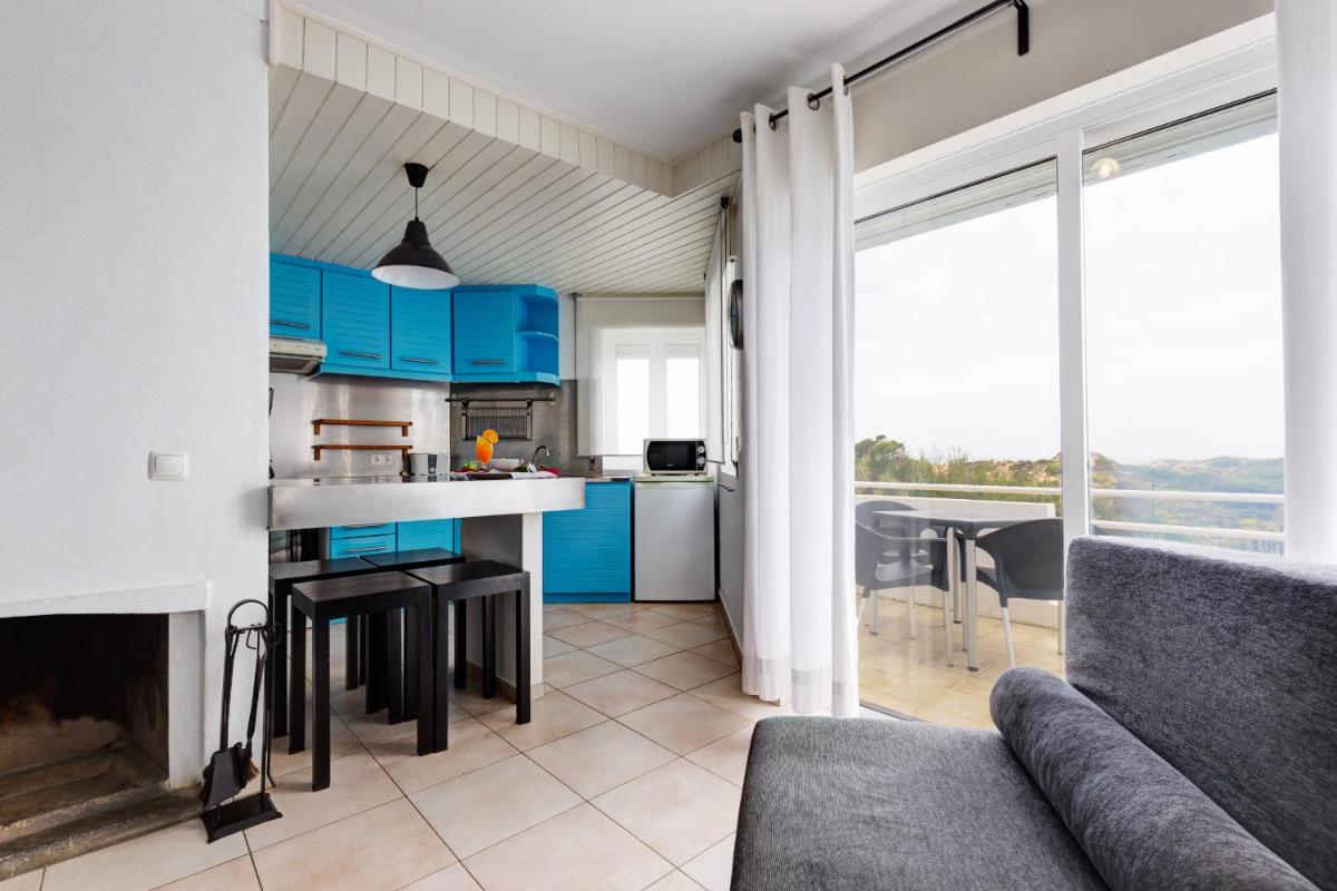 A cozinha ou kitchenette de Duna Parque Beach Club - Duna Parque Group