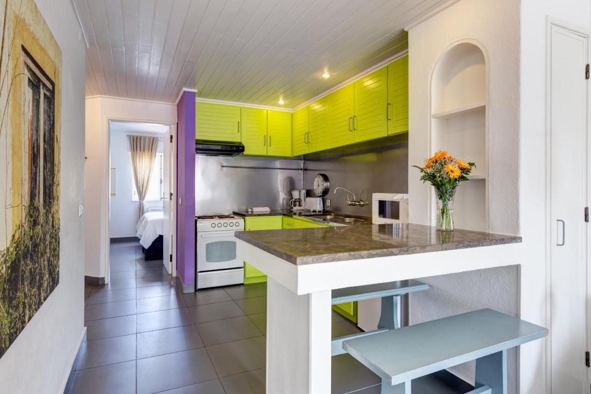 A cozinha ou kitchenette de Duna Parque Beach Club - Duna Parque Group
