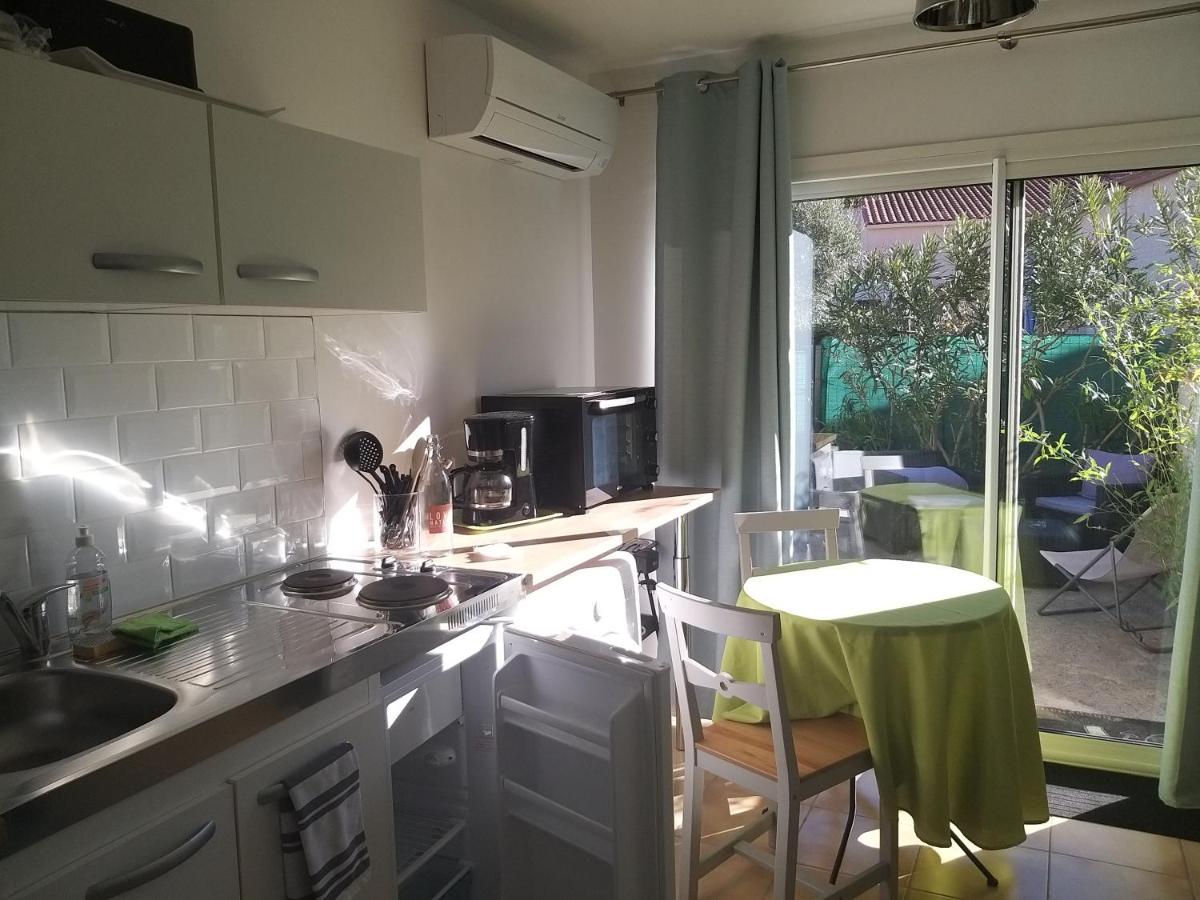 Rez de jardin cosy avec terrasse fleurie - Housity
