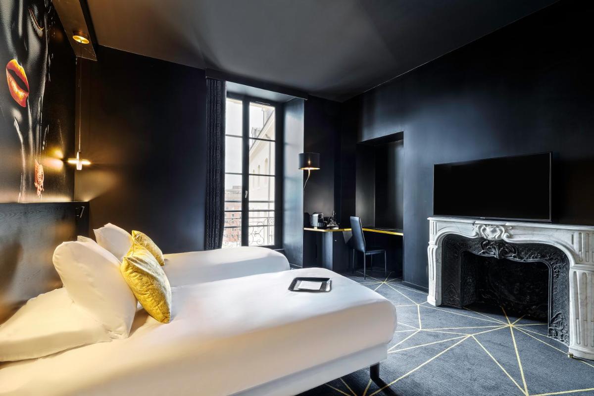 Un ou plusieurs lits dans un hébergement de l'établissement Hotel Leprince, Best Western Premier Collection