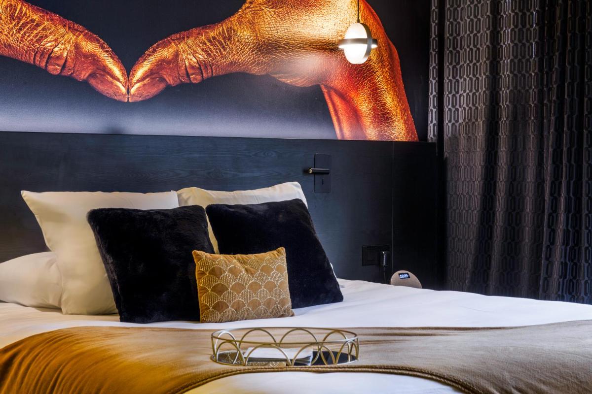 Un ou plusieurs lits dans un hébergement de l'établissement Hotel Leprince, Best Western Premier Collection