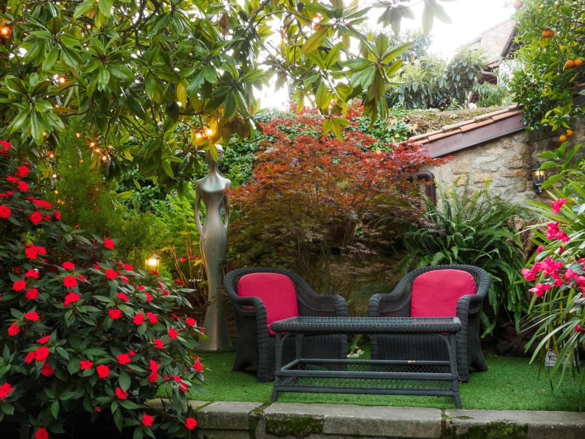 Jardín al aire libre en Hotel Casa del Marqués