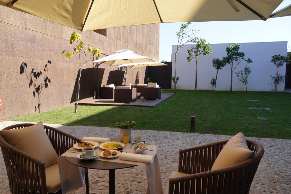 Uma área de estar em DS Hotel Lusopark