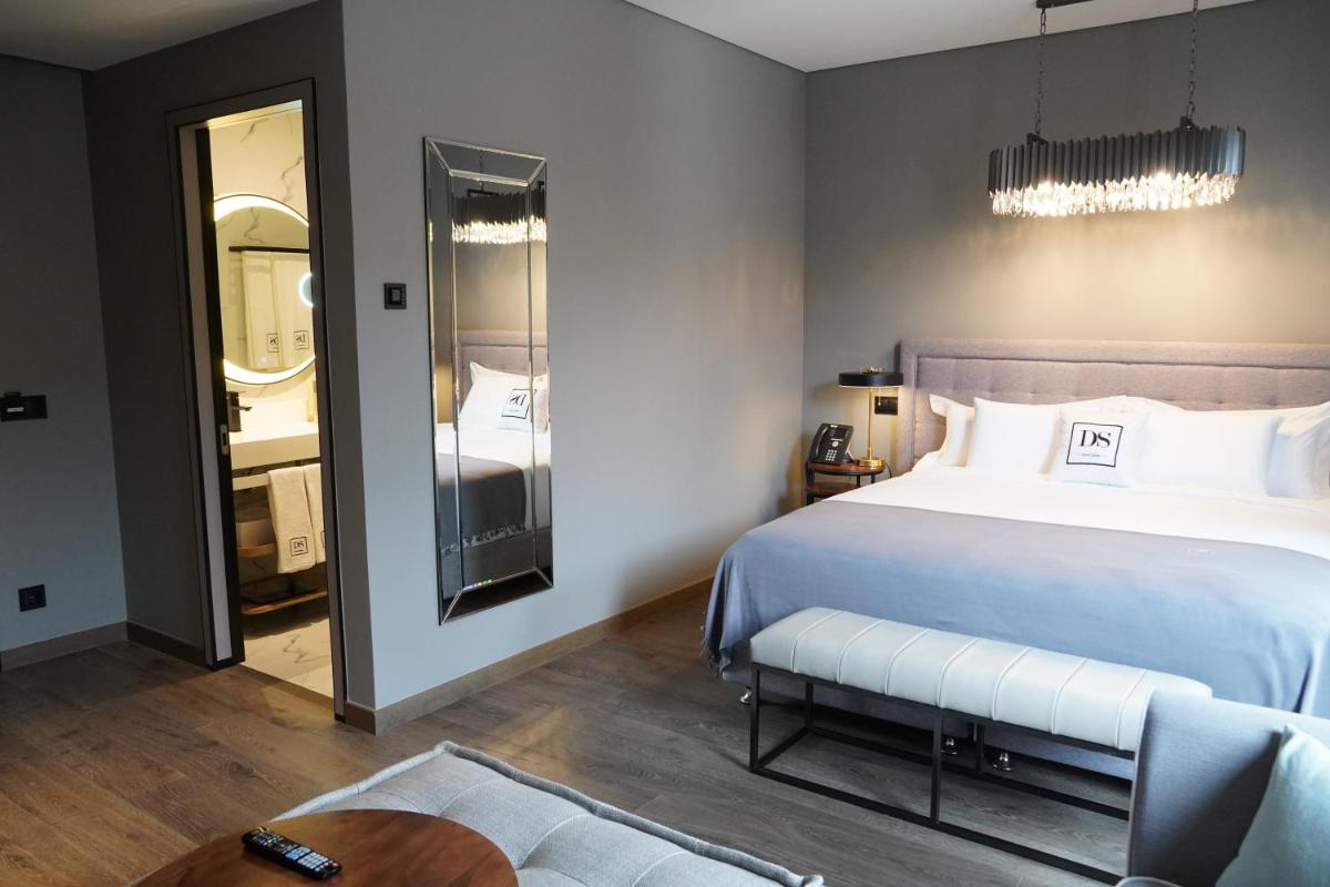 Uma cama ou camas num quarto em DS Hotel Lusopark
