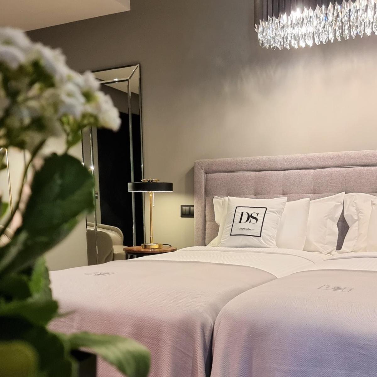 Uma cama ou camas num quarto em DS Hotel Lusopark