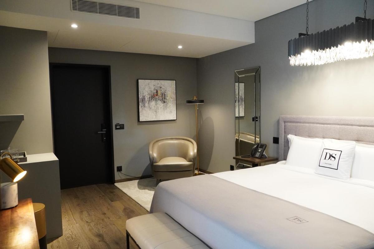 Uma cama ou camas num quarto em DS Hotel Lusopark