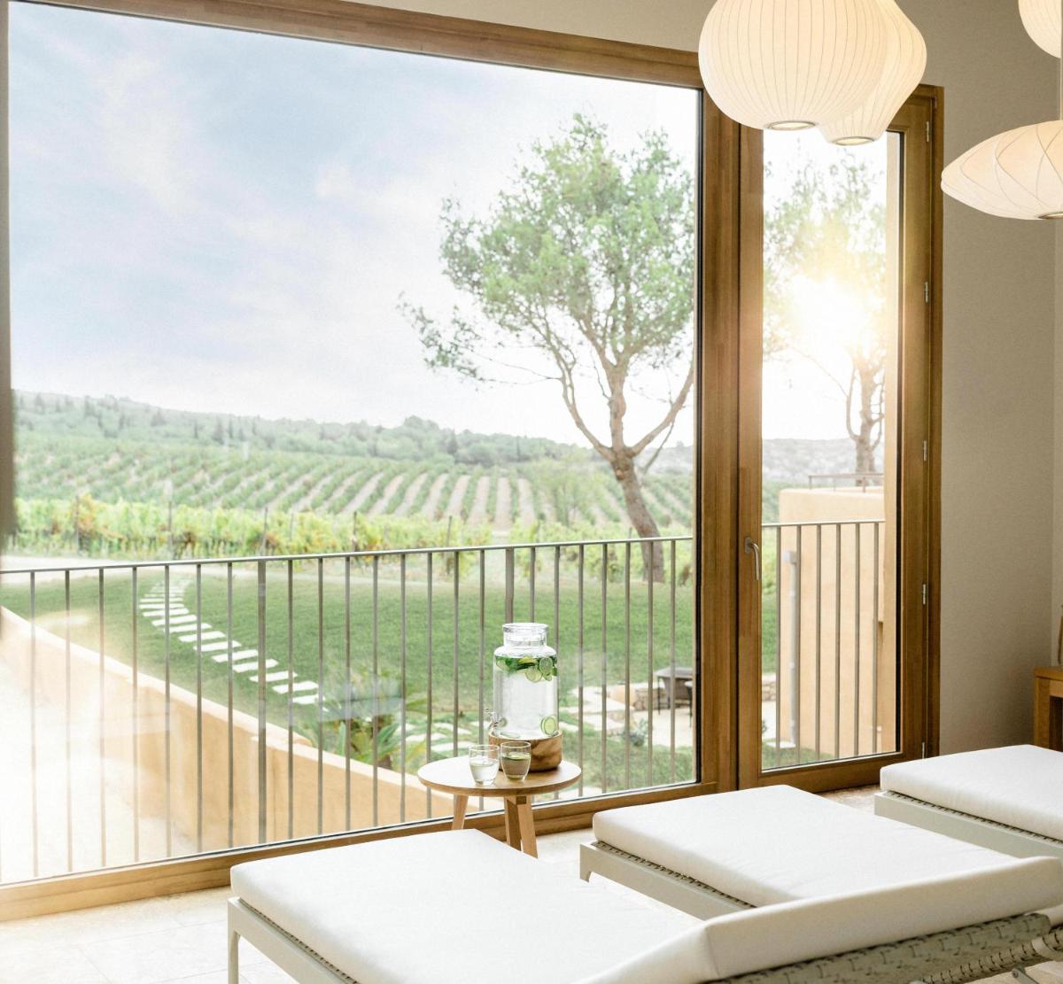 Un ou plusieurs lits dans un hébergement de l'établissement Château L'Hospitalet Wine Resort Beach & Spa