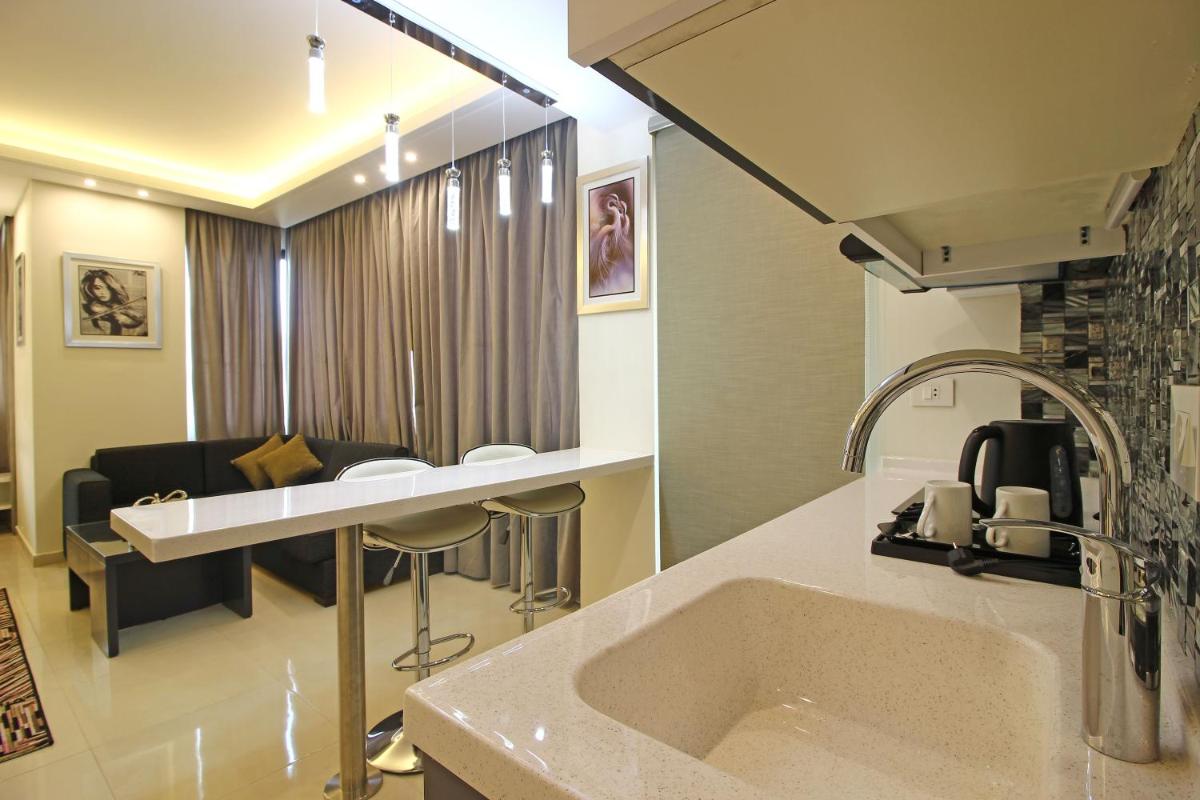 Palm Ville Suites - Housity