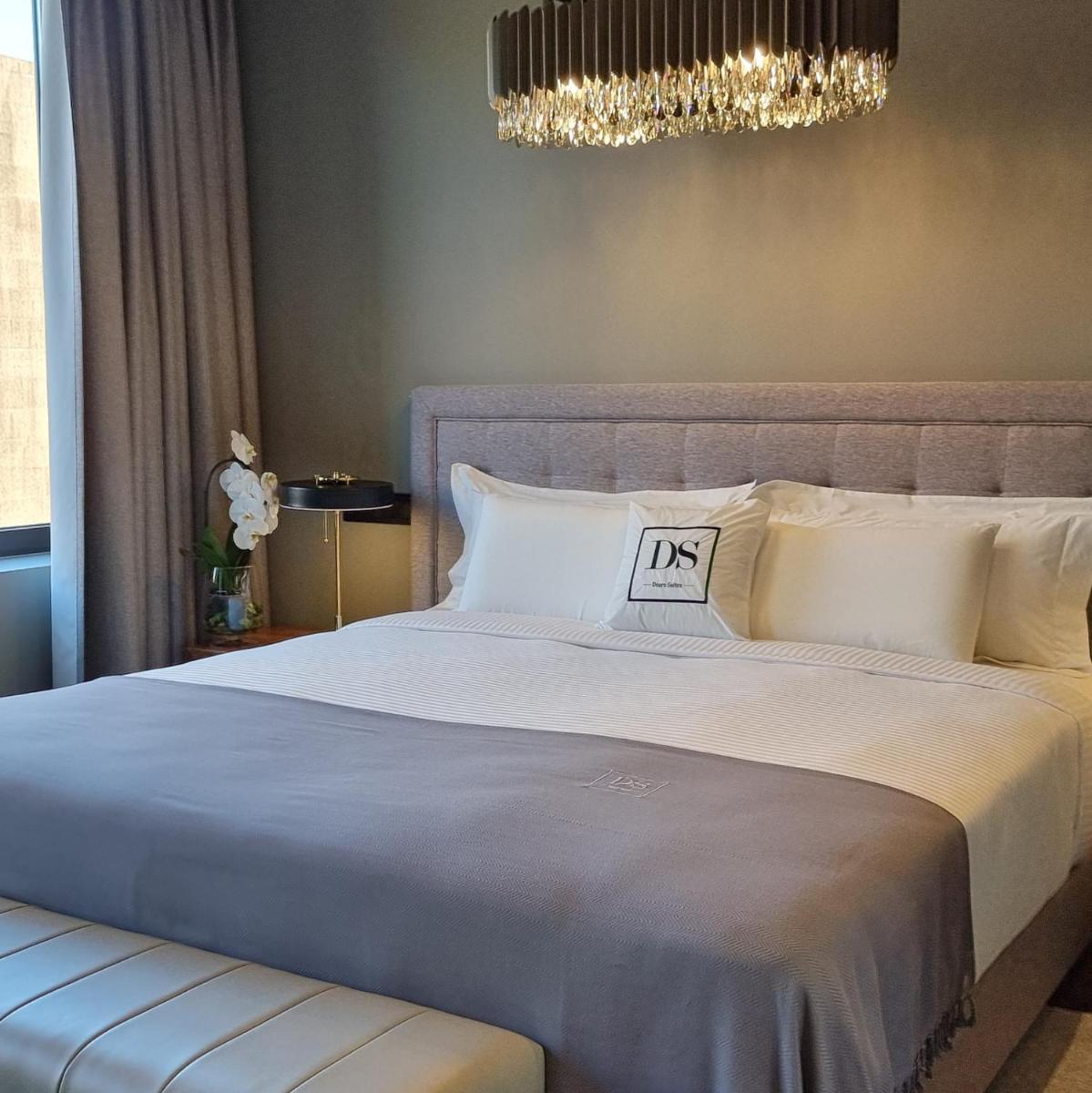 Uma cama ou camas num quarto em DS Hotel Lusopark
