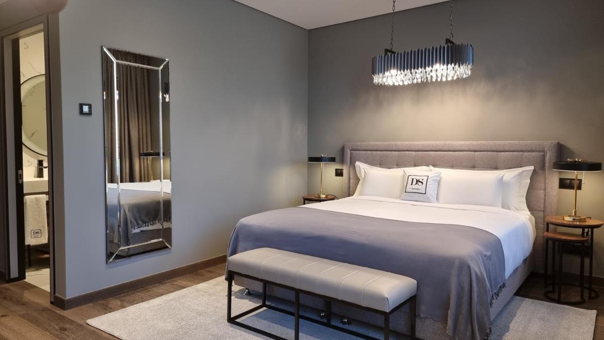 Uma cama ou camas num quarto em DS Hotel Lusopark