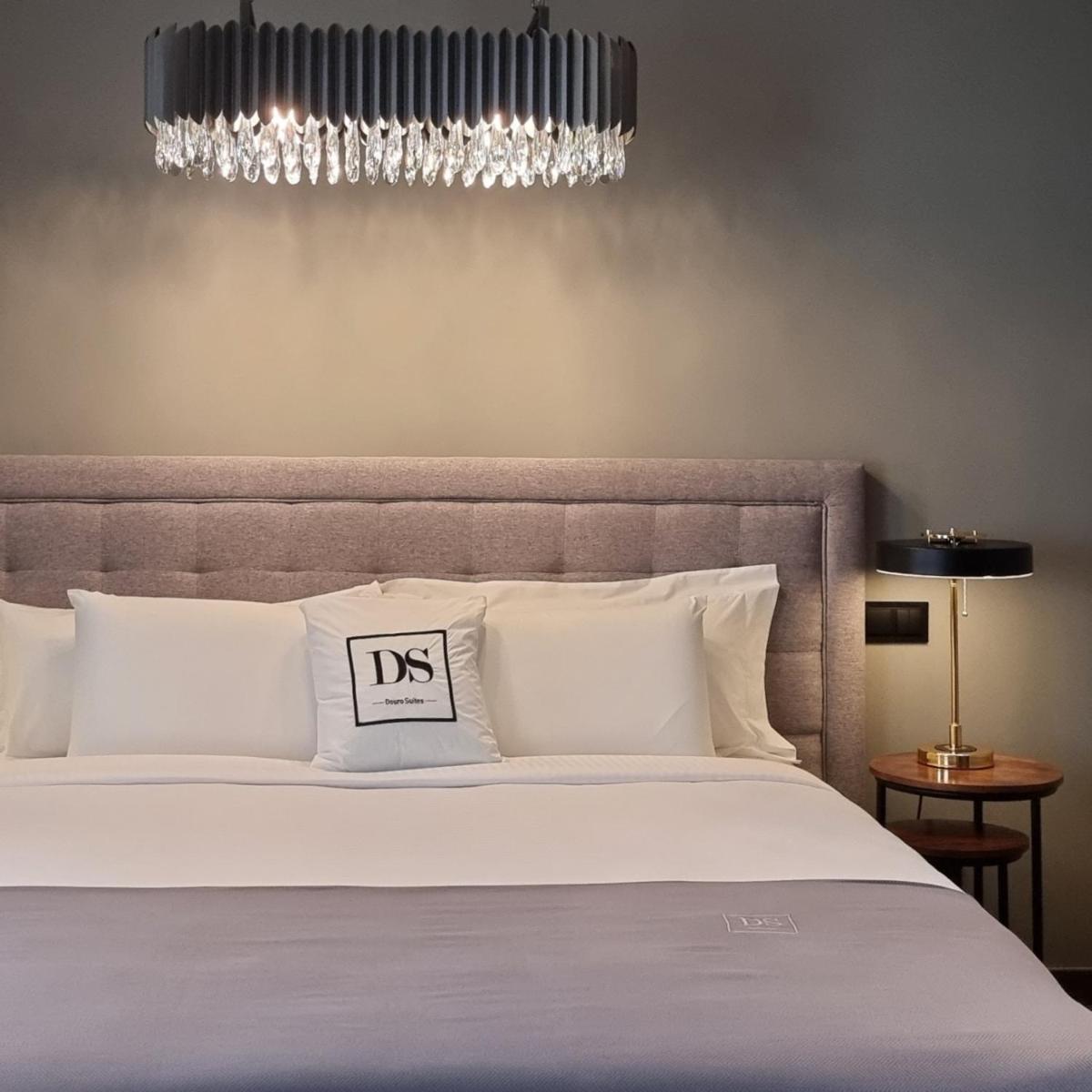 Uma cama ou camas num quarto em DS Hotel Lusopark