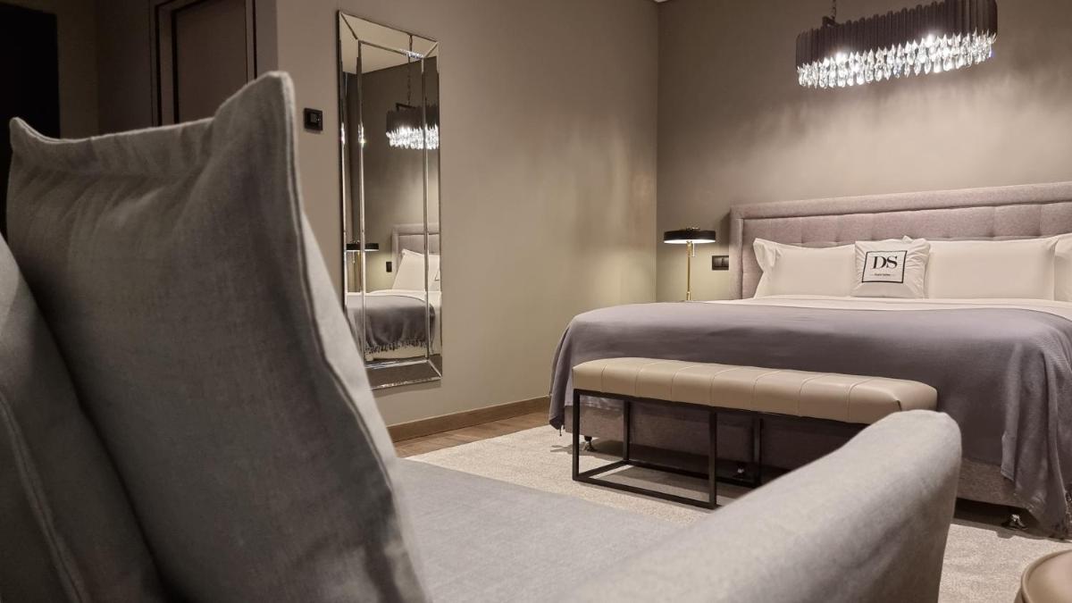 Uma cama ou camas num quarto em DS Hotel Lusopark