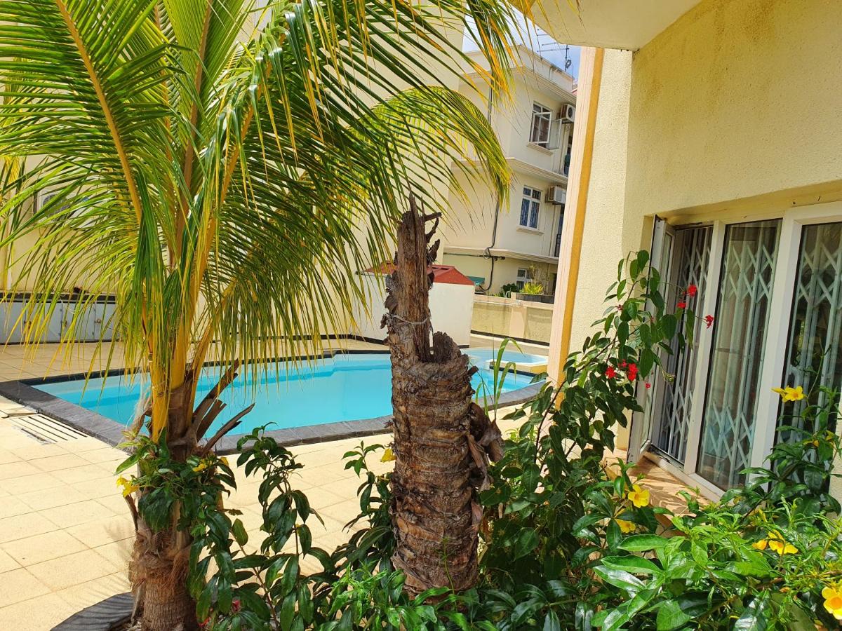 Soleil sur mer flic en flac - Housity