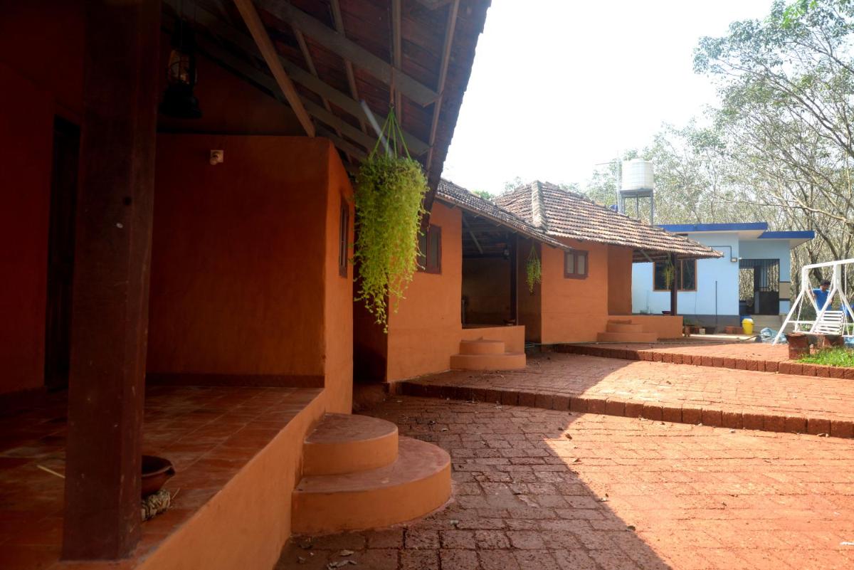 Kudil Mud Cottages, Cheemeni - Housity