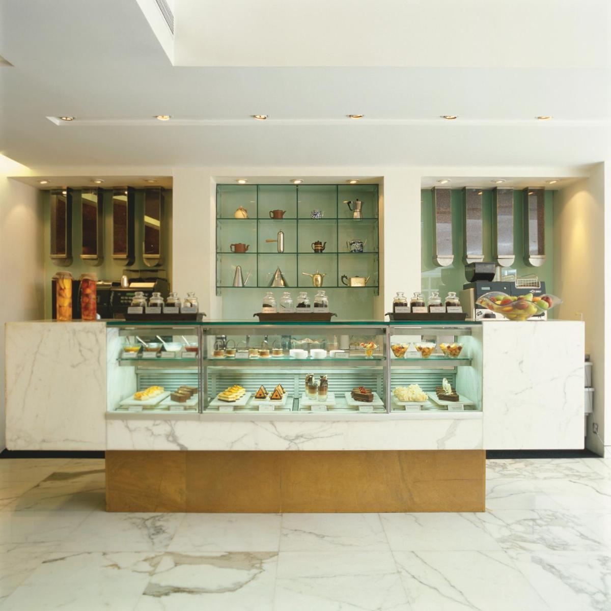 a bakery with a display case filled with pastries at Trident Nariman Point in Mumbai a bakery with a display case filled with pastries at Trident Nariman Point in Mumbai