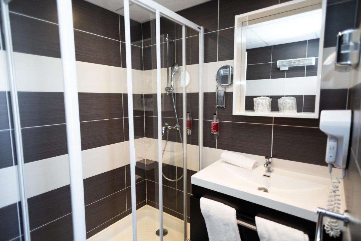 Salle de bains dans l'établissement Hotel Regina & Spa