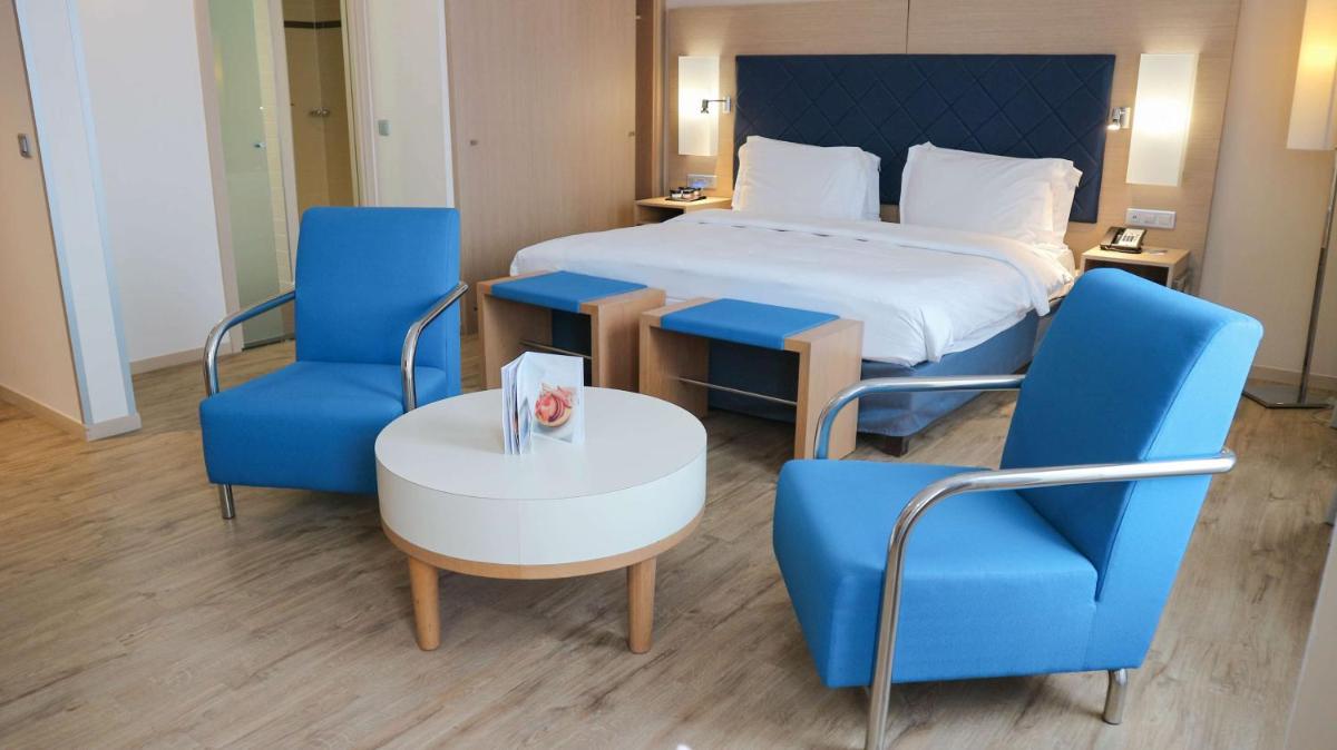 Un ou plusieurs lits dans un hébergement de l'établissement Radisson Blu Hotel Toulouse Airport