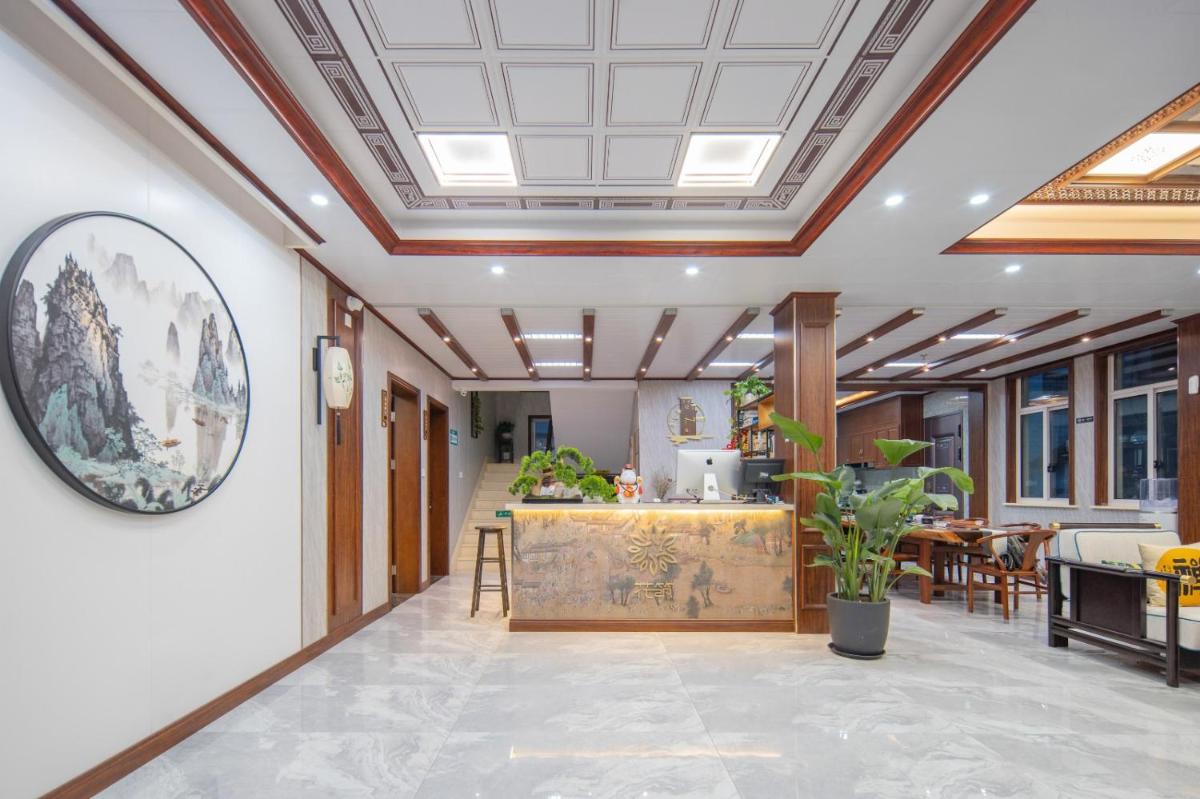 Huazhusuzhouzhouzhuangyilanxuanminsujiudian - Housity