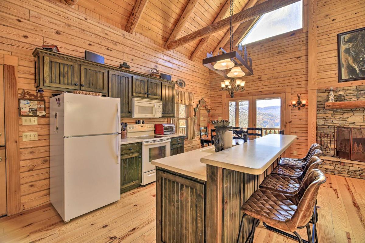 Lansing Cabin with 2 Huge Wraparound Decks and Hot Tub - Housity